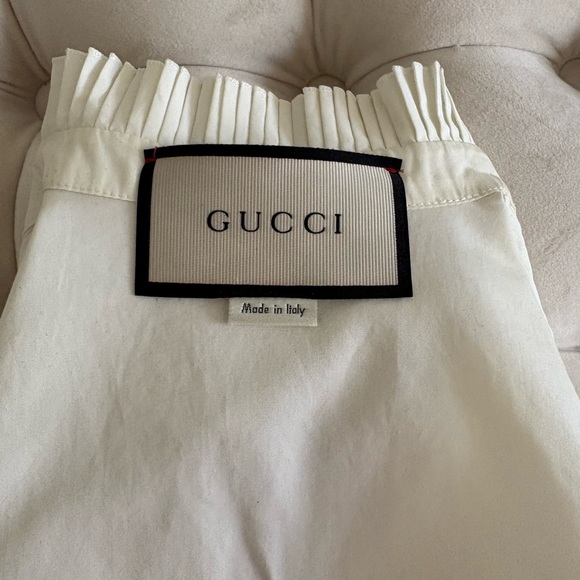 Authentic Gucci off-white with black trim blouse size Euro 38. - Picture 9 of 10